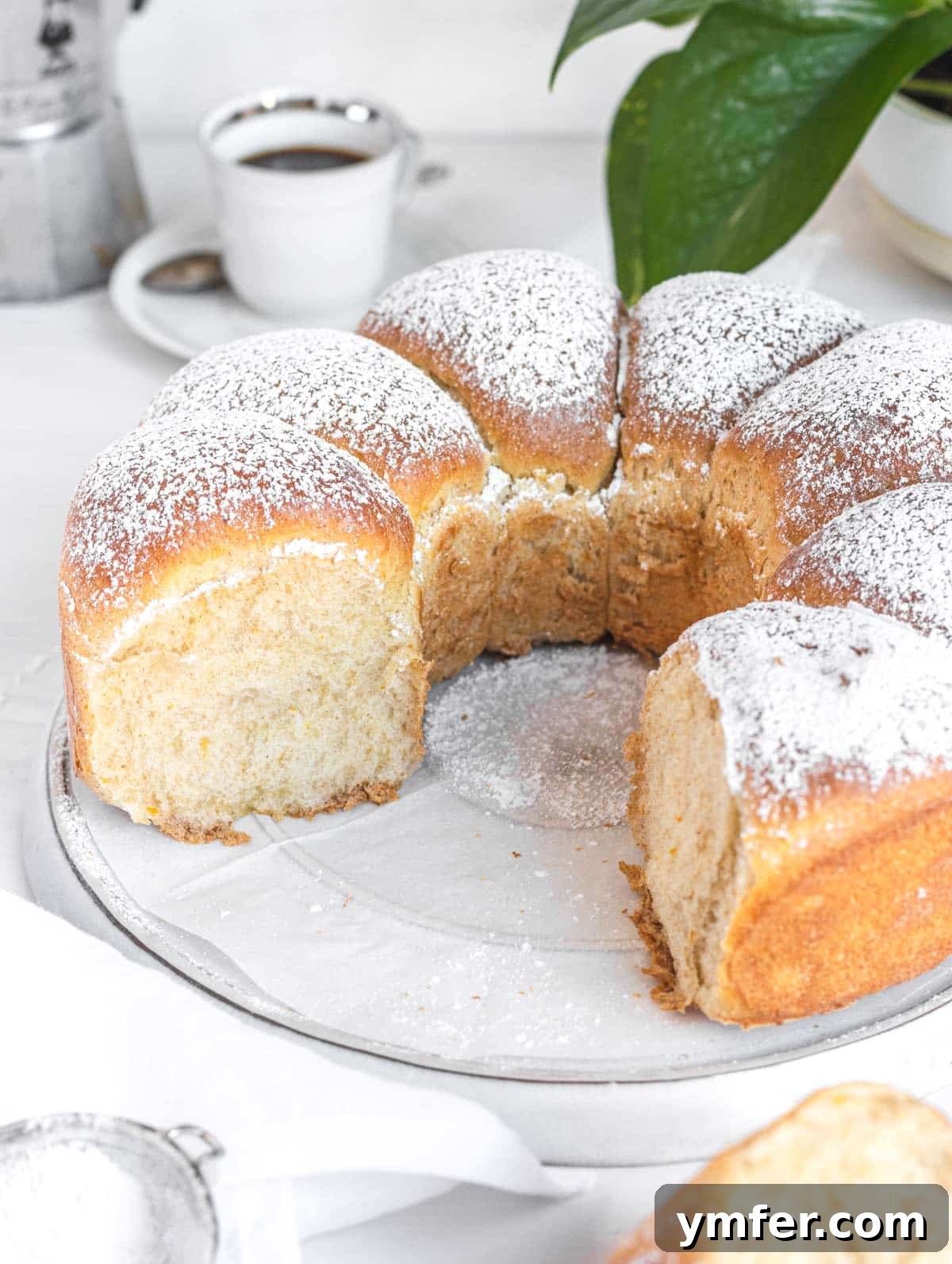 Heavenly Vegan Brioche 2 Delicious vegan brioche bread paired with a cup of coffee, perfect for breakfast.