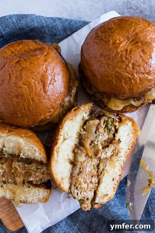 2017's Standout Content 7 Sweet apple butter onion chicken burgers with smoked Gouda cheese and homemade apple butter caramelized onions, ideal for game day or outdoor grilling.