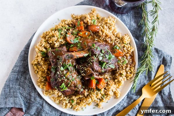 Succulent Red Wine Instant Pot Short Ribs 3 Instant Pot Short Ribs with Red Wine, artfully plated alongside a vibrant ancient grain medley.