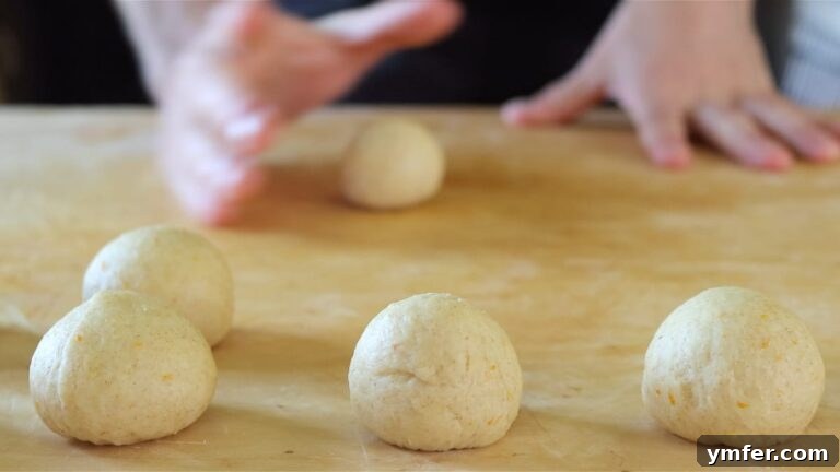 Rolling the dough into smooth small balls