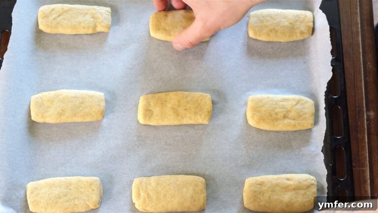 Second proofing of shaped brioches on a baking tray