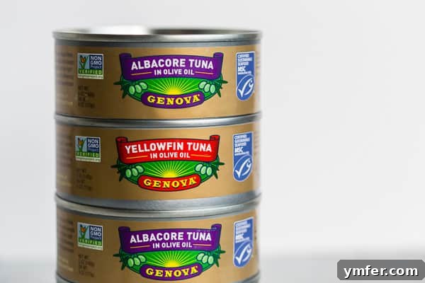 Zesty Mediterranean Tuna Flatbread 3 Stacked cans of unopened tuna in olive oil.