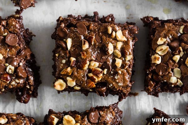 Hazelnut Buckwheat Brownies topped with nuts. 