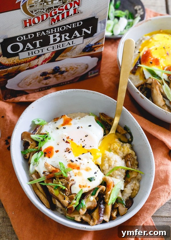 Asian Umami Oat Bran 6 A close-up of Savory Asian Oat Bran, topped with a perfectly fried egg, showing off its rich flavors.
