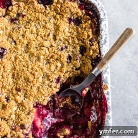 Cardamom Plum Crisp with Vanilla Bean 5 This cardamom vanilla plum crisp is filled with juicy plums and topped with a crunchy oatmeal hazelnut topping. It's the perfect sweet treat to end the day with a perfect hint of vanilla bean and cardamom flavor.