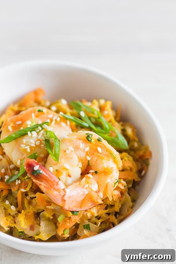 One-Pan Spicy Shrimp Egg Roll Bowl 3 The Spicy Shrimp Egg Roll Skillet sprinkled generously with sesame seeds, ready to be served.