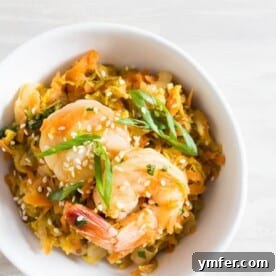 One-Pan Spicy Shrimp Egg Roll Bowl 6 This spicy shrimp egg roll skillet is the quick and easy weeknight meal you need! It's packed full of napa cabbage, carrots, garlic, ginger, and spicy shrimp. It's ready in just 30 minutes and packed full of flavor!