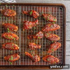 Crispy apple butter chicken wings with a sweet and spicy honey mustard glaze.