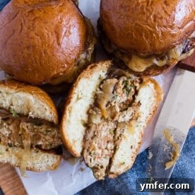Juicy apple butter onion chicken burgers, stacked high with smoked Gouda and caramelized onions.