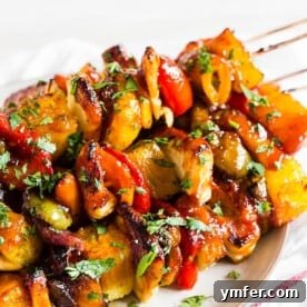 Island Pineapple Chicken Skewers 6 These BBQ Hawaiian chicken kebabs are packed full of flavor and the perfect grilling recipe. Chunks of chicken breast paired with bell pepper, red onion, pineapple and glazed with tangy BBQ sauce - what's not to love?