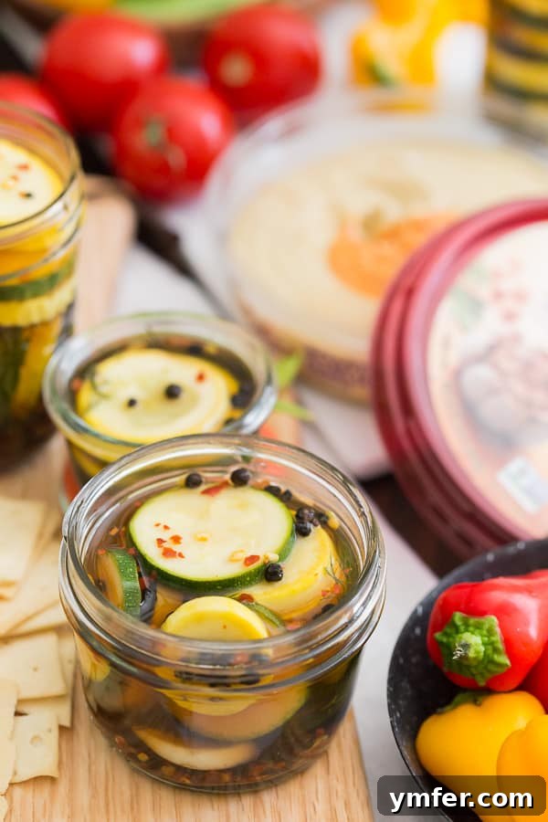 Zesty Zucchini Zingers 5 Small individual servings of sweet and spicy zucchini pickles in glass jars, perfectly portioned for snacking or sharing.