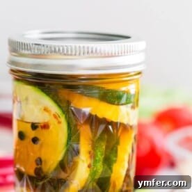 Zesty Zucchini Zingers 8 sweet and spicy zucchini pickles in a glass canning jar