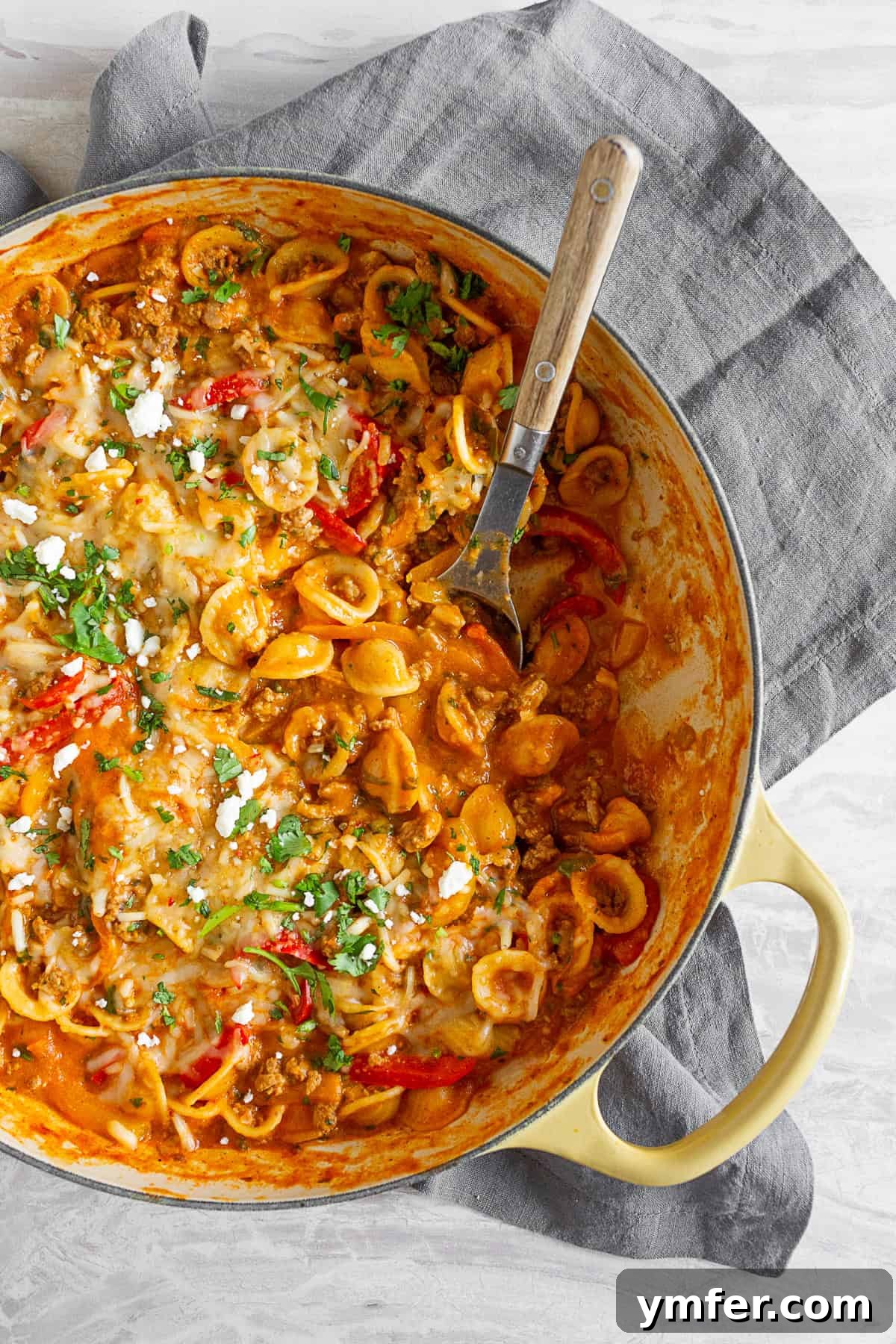 Zesty One-Pot Ground Chicken Fajita Pasta 2 One-Pot Ground Chicken Fajita Pasta simmering in a skillet, ready to be served.