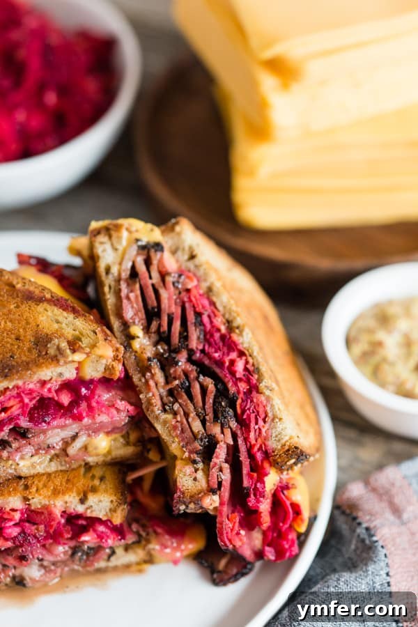 Grilled Pastrami and Root Slaw Sandwich 6 Grilled Pastrami Sandwich with Root Vegetable Slaw served on a clean white plate, ready to be enjoyed.