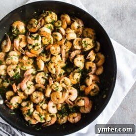 Hot Garlic Cilantro Shrimp 7 This spicy garlic cilantro shrimp is the perfect easy dinner or party appetizer. Made with spicy cayenne olive oil, dry sherry, lots of thinly sliced garlic, garlic chili sauce, wild-caught shrimp and lots of fresh cilantro. You’ll love this quick and easy dish!