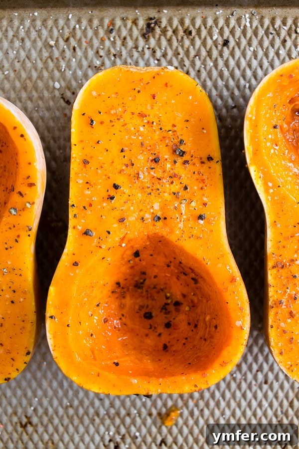 Savory Stuffed Honeynut Squash 5 Slices of perfectly seasoned and roasted honeynut squash, showcasing its vibrant orange flesh and slightly caramelized edges, ready to be enjoyed or incorporated into a dish.
