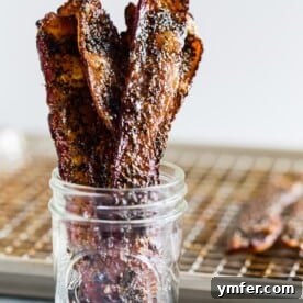 This maple black pepper bacon is the perfect balance of sweet and savory. Eat it as a midday snack or sneak a few bites as a midnight snack. Made with maple syrup, maple sugar and a lot of fresh cracked black pepper. You'll love these crispy little bites.