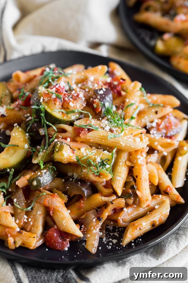 Provencal Pasta Medley 4 Ratatouille Pasta garnished with basil and a sprinkle of cheese.