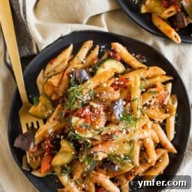 This ratatouille pasta is packed full of eggplant, zucchini, fennel, onion, and tomatoes. It's simple to make and ready in no time! Trust me, you'll love this simple meatless pasta recipe.