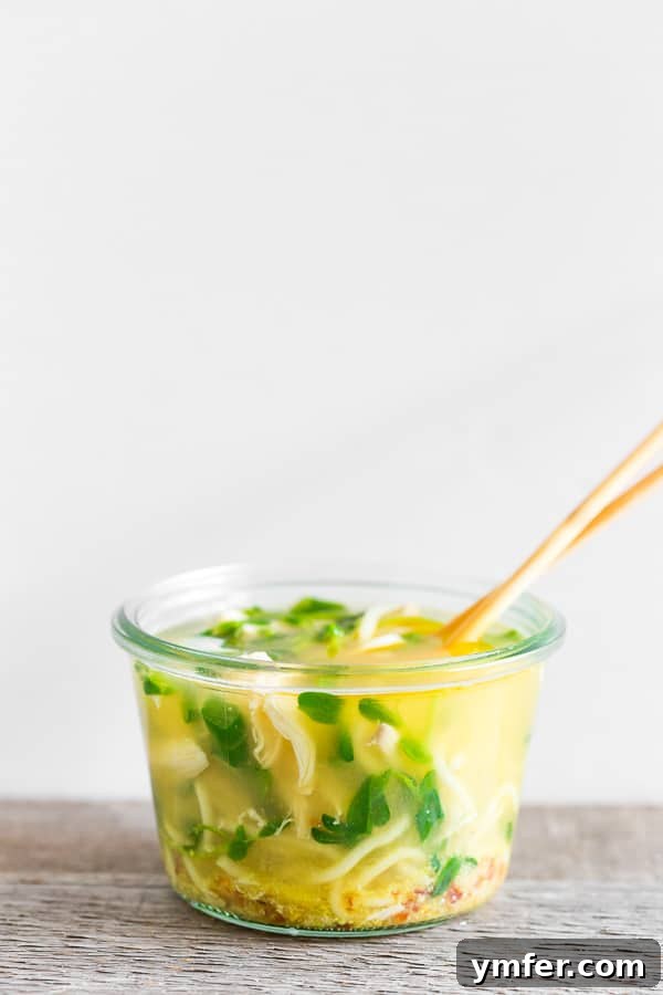 Instant Ramen Jars 11 A close-up of a homemade cup of noodles in a small glass jar, showcasing its fresh ingredients and inviting appeal.