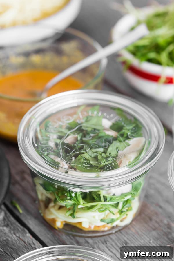 Instant Ramen Jars 8 Four perfectly assembled homemade cup of noodles in glass jars with lids, ready for refrigeration and future enjoyment.