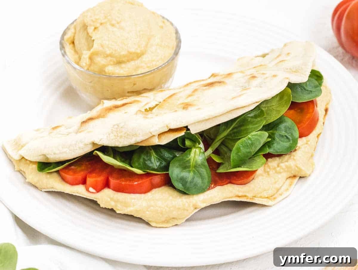 Piadina with hummus and leafy greens