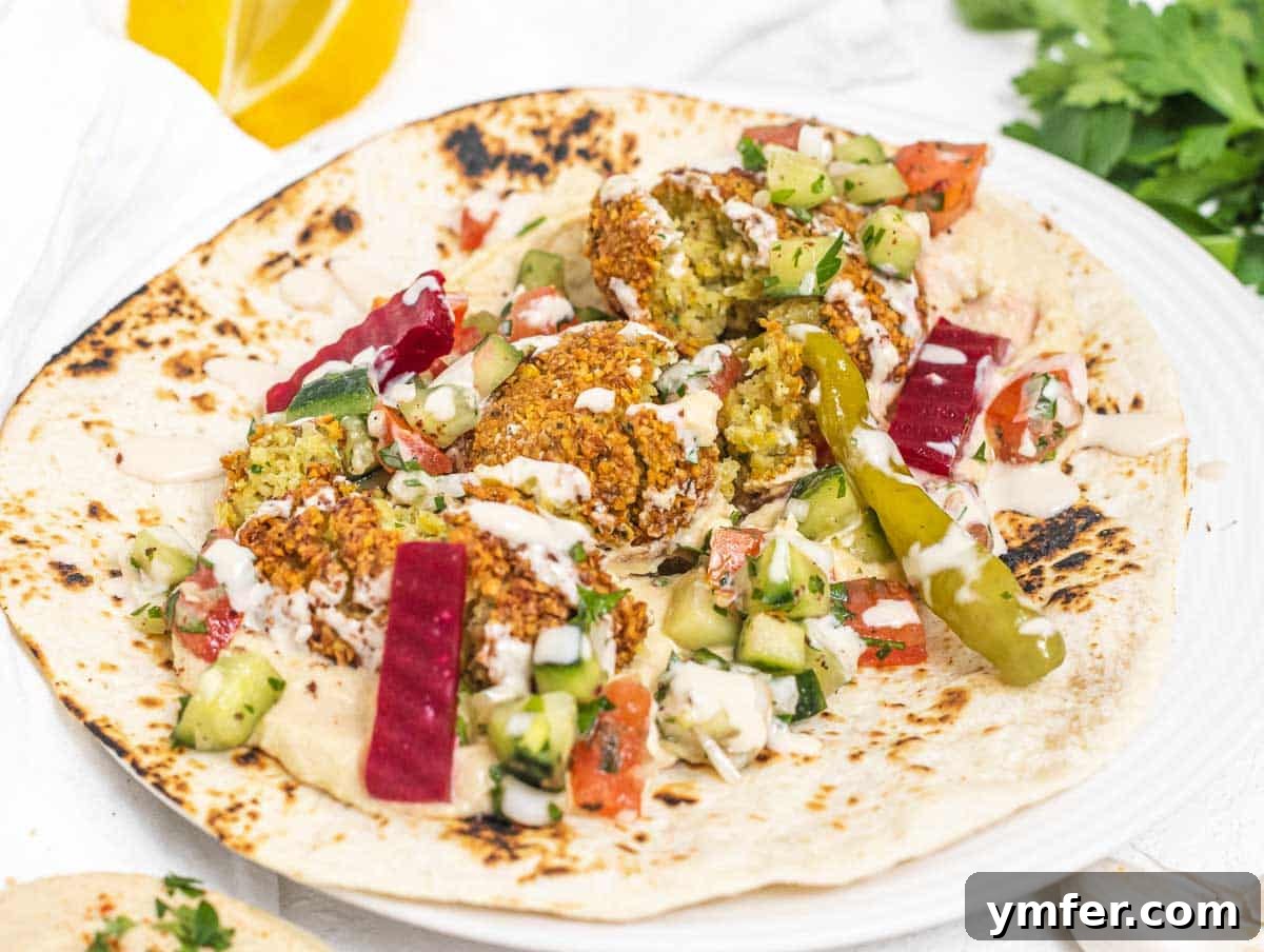 Falafel in a wrap with tahini sauce
