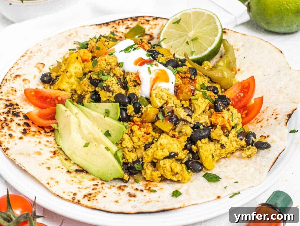 Vegan breakfast burrito with tofu scramble
