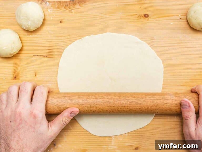 rolling out the piadina with a rolling pin