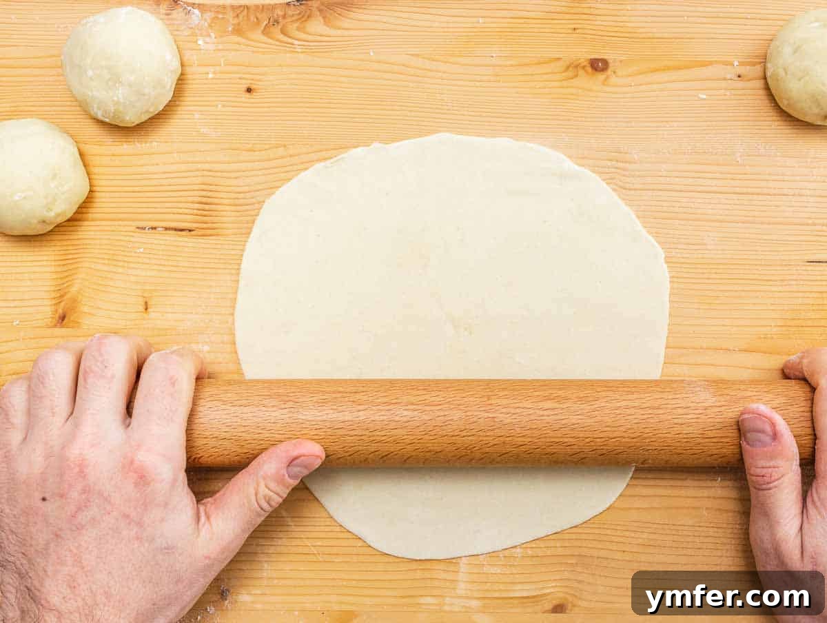 rolling out the piadina with a rolling pin