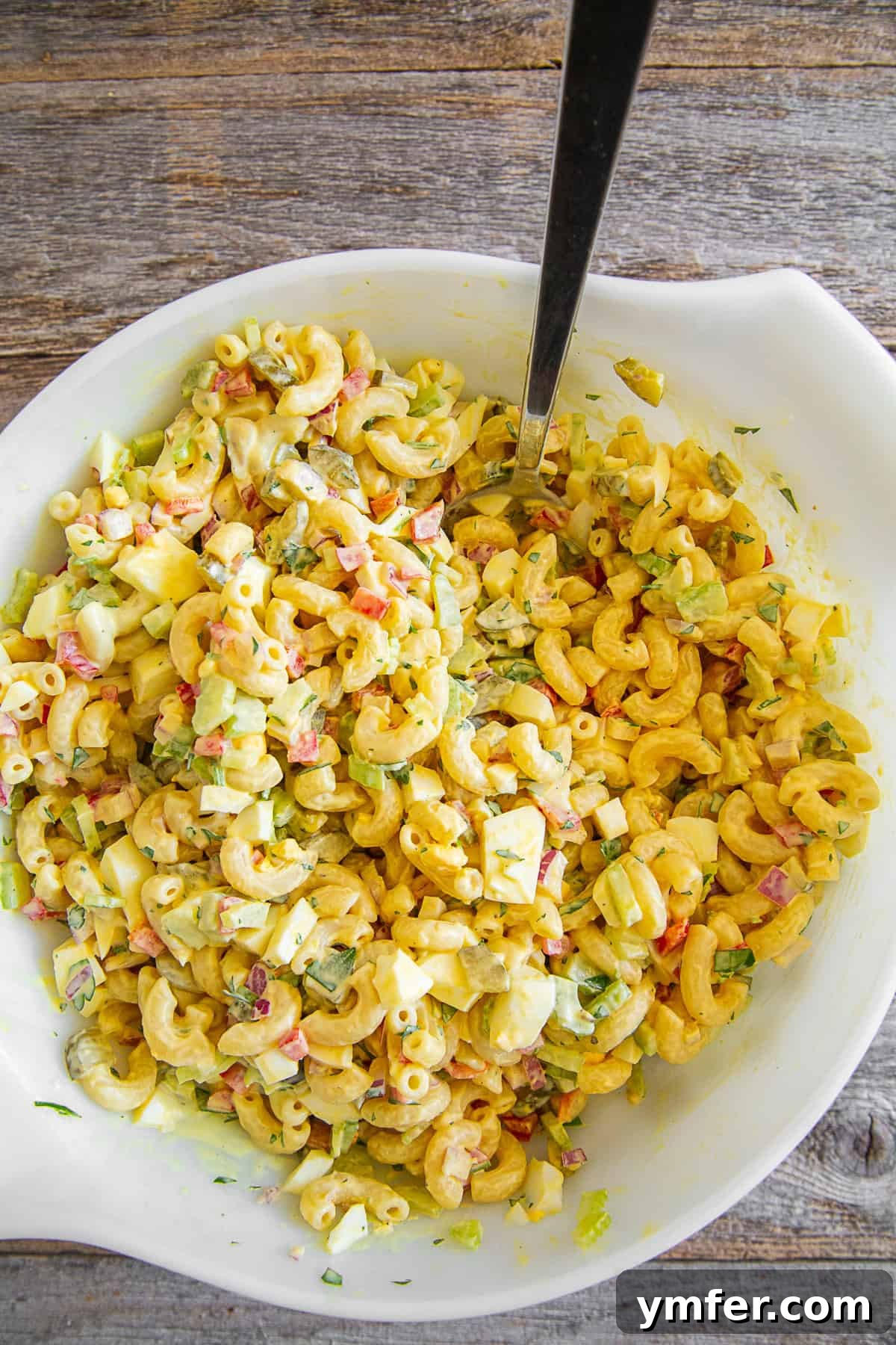 Grandma's Macaroni Salad 2 Classic Macaroni Salad in a large serving bowl, ready to be enjoyed.