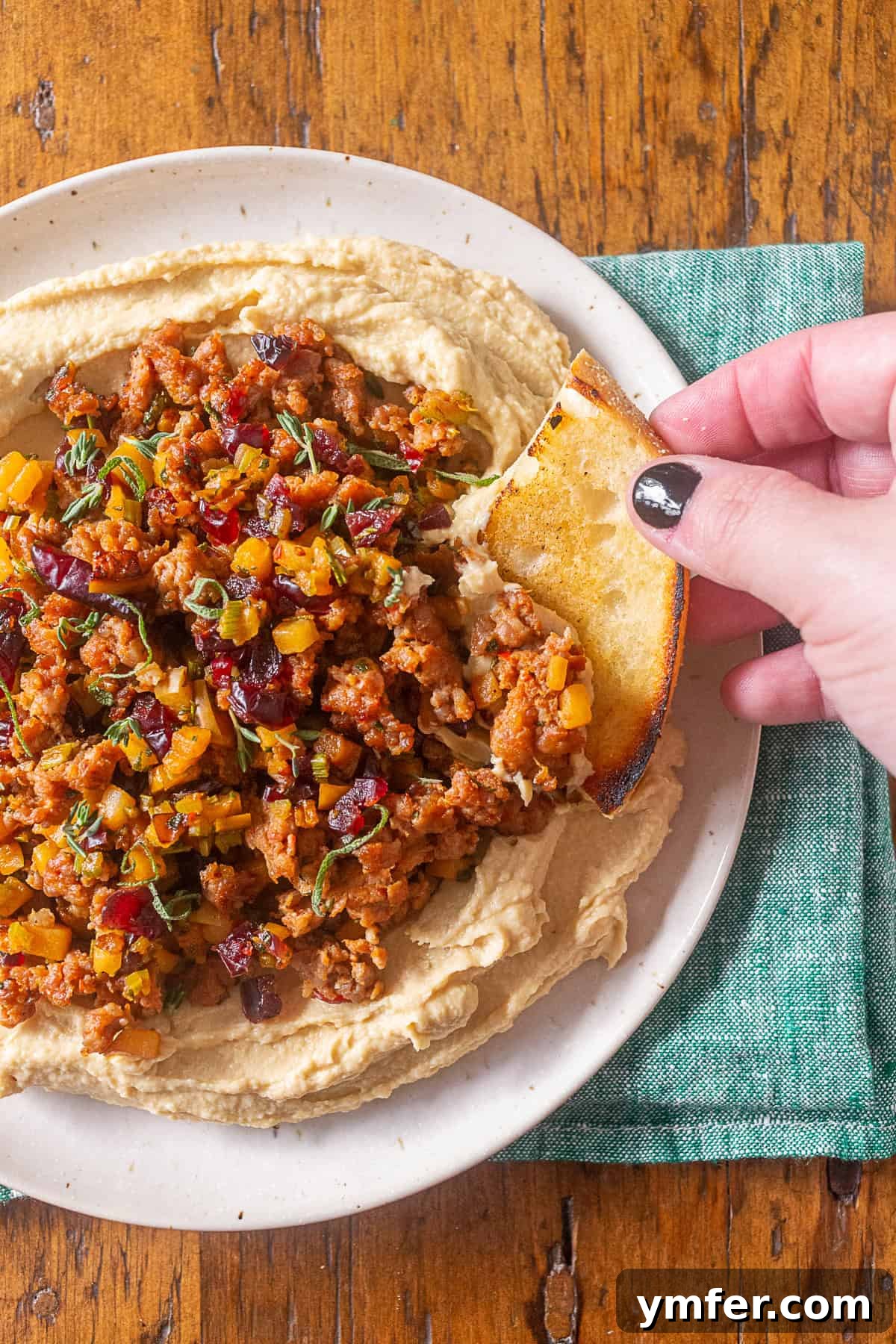 Stuffing Crusted Hummus 3 thanksgiving stuffing topped hummus with crusty bread for dipping