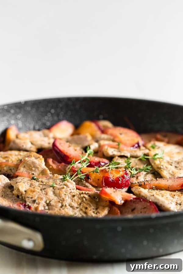 Plum-Glazed Pork Tenderloin Skillet 4 side shot of skillet pork tenderloin with plums