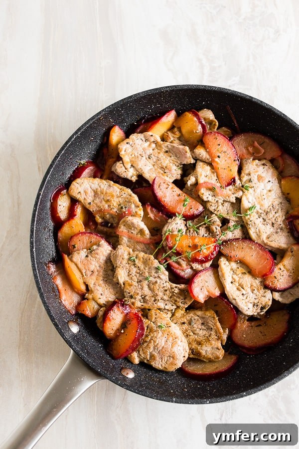 Plum-Glazed Pork Tenderloin Skillet 5 overhead shot of skillet pork tenderloin with plums