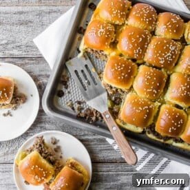 Cheesy Bacon Pull-Apart Sliders 6 baked bacon cheeseburger sliders on a sheet pan and plate