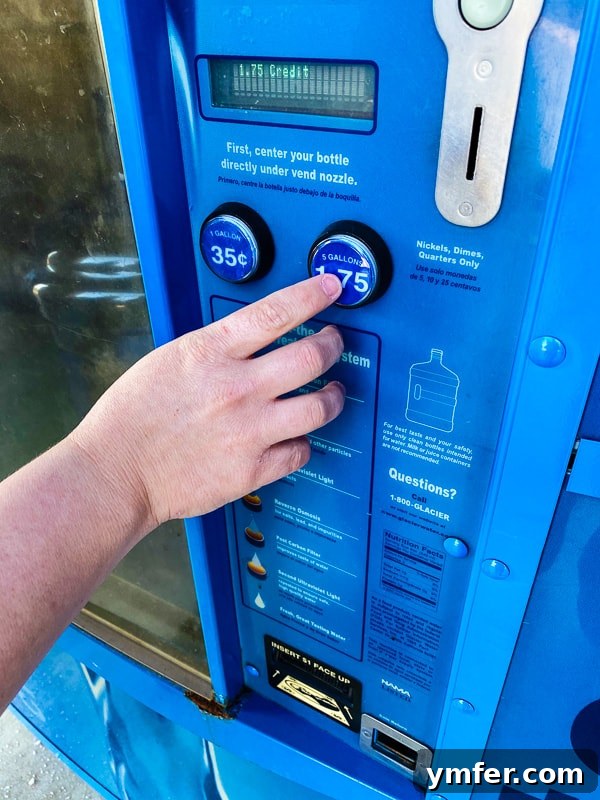 5 Easy Hacks to Boost Your Water Intake 8 A Primo 5-gallon water bottle being placed into a water dispenser, highlighting the ease of refilling and use.