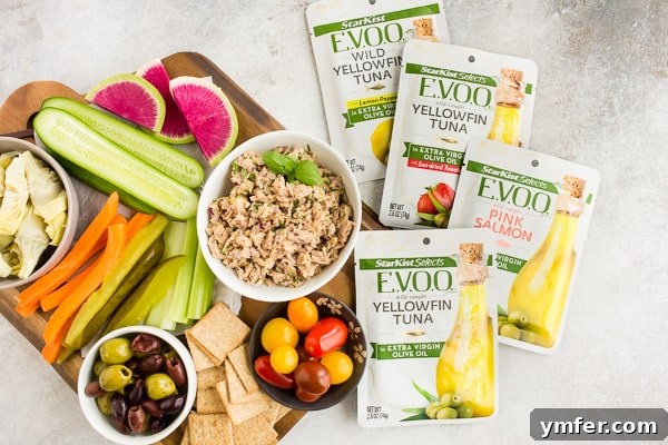 Zesty Tuna & Herb Grazing Board 4 lemon herb tuna salad surround by tuna pouch packaging