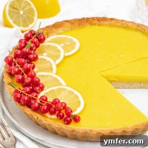 Lemon tart with lemon slices and berries