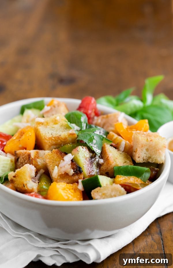 Chargrilled Sourdough & Summer Vegetable Panzanella 5 grilled sourdough panzanella salad in a white bowl