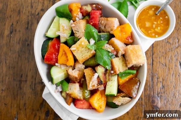Chargrilled Sourdough & Summer Vegetable Panzanella 6 grilled sourdough panzanella salad with tomatoes in a bowl