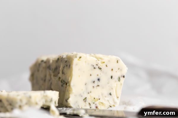 garlic herb compound butter sitting on paper