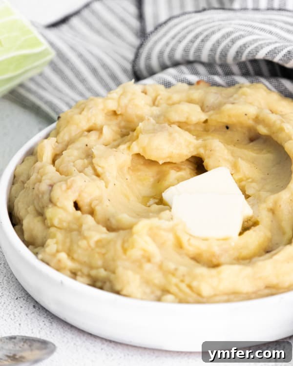 Creamy Instant Pot Colcannon 3 Close-up of creamy Instant Pot Colcannon Potatoes, showcasing the mashed texture and hints of green cabbage.