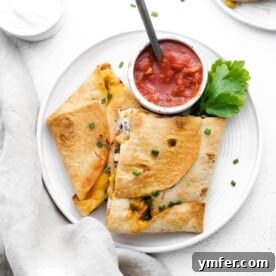 One-Pan Chicken Quesadillas 7 Delicious Sheet Pan Chicken Quesadillas ready to be served.