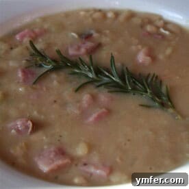 Hearty Rosemary Ham and White Bean Soup 2 This white bean ham rosemary soup is the perfect wintertime soup. Full of rosemary flavor mixed with creamy white beans and smoked ham.