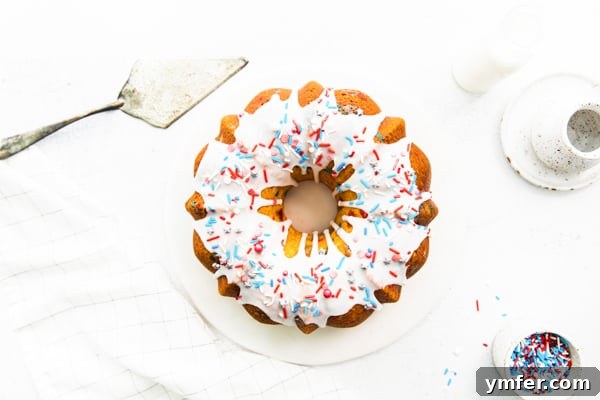 Red, White, and Bundt 6 A beautifully displayed Fourth of July Bundt Cake on a festive table setting, ready for guests.