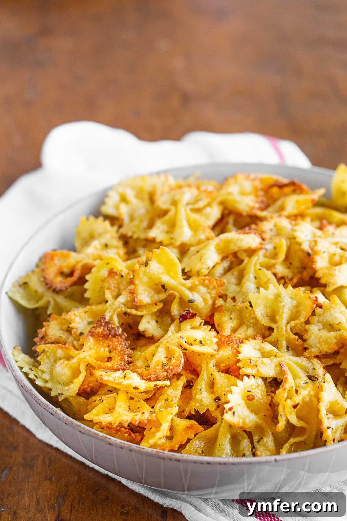 Crispy Air Fryer Pasta Chips 4 A bowl of freshly made air fryer pasta chips, perfectly golden and crispy.
