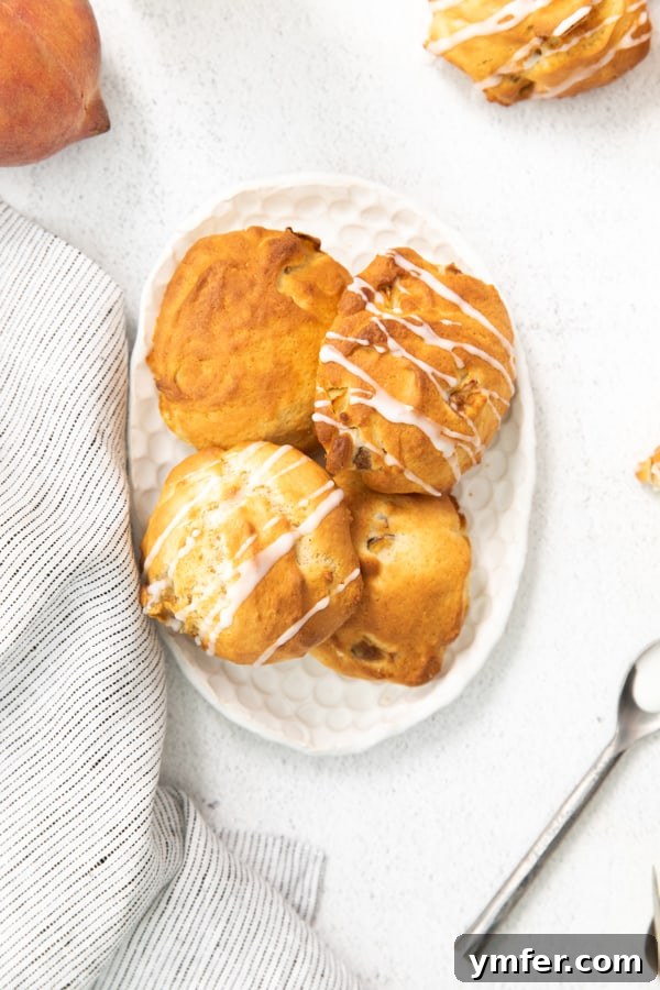 Air-Fried Peachy Delights 3 Air fryer peach fritters generously drizzled with sweet vanilla glaze.