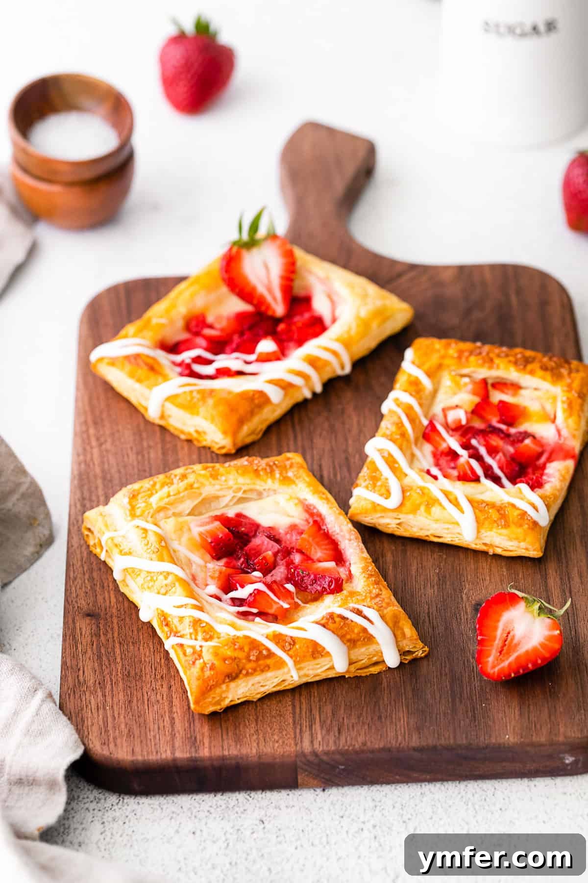 Creamy Strawberry Danish Delight 6 A beautifully baked easy strawberry cheesecake Danish, generously drizzled with a sweet glaze.