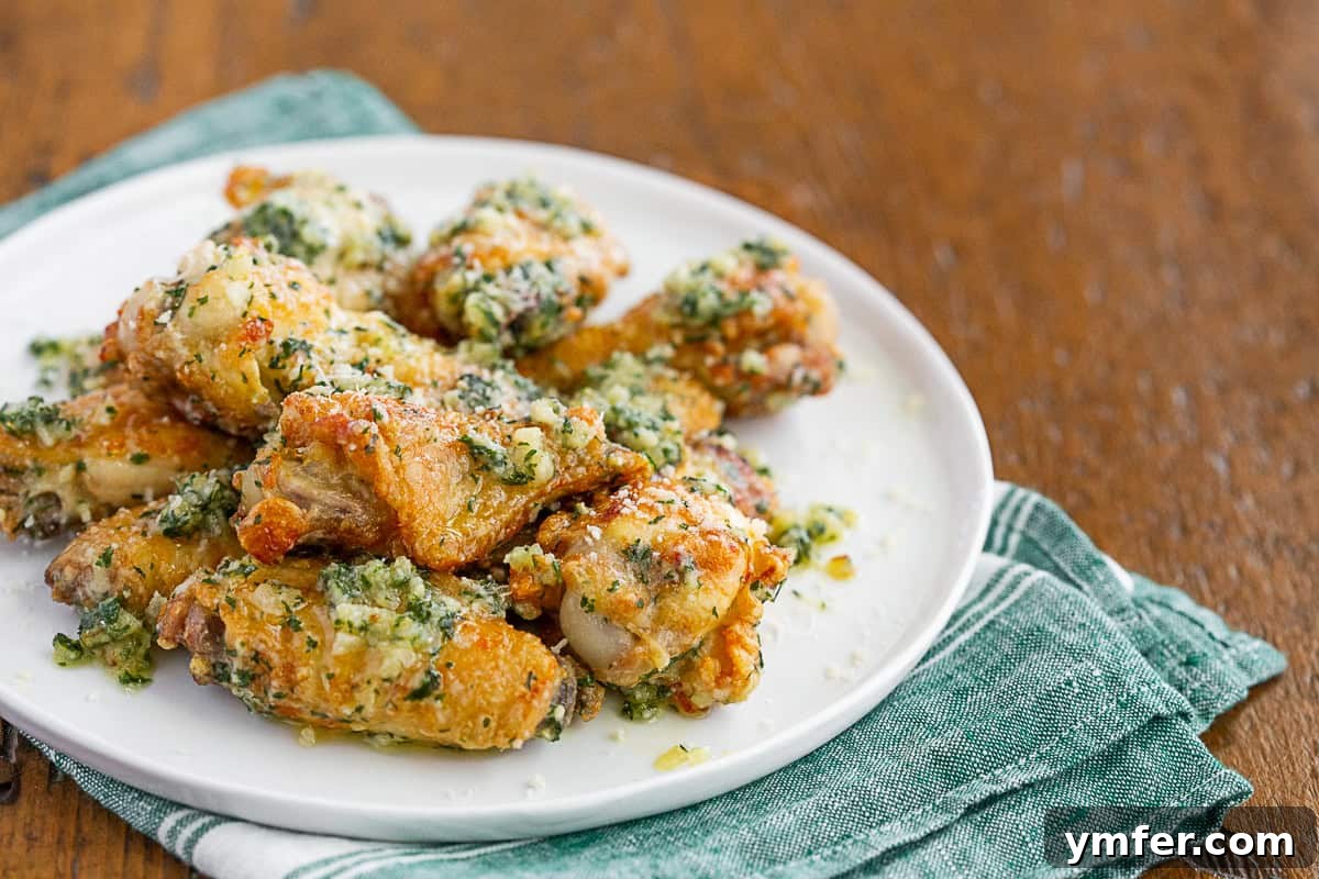 Crispy Air Fryer Garlic Parmesan Wings 5 Garlic Parmesan Chicken Wings served with extra garlic sauce.