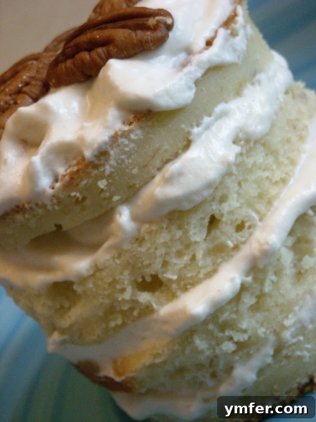 Banana Layer Cake with Caramel Cream by Nutmeg Nanny Close-up of a slice of Banana Layer Cake with Caramel Cream